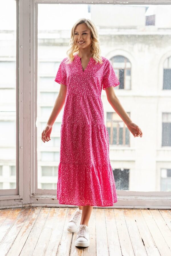 Long dress with ruffle trim in pink color